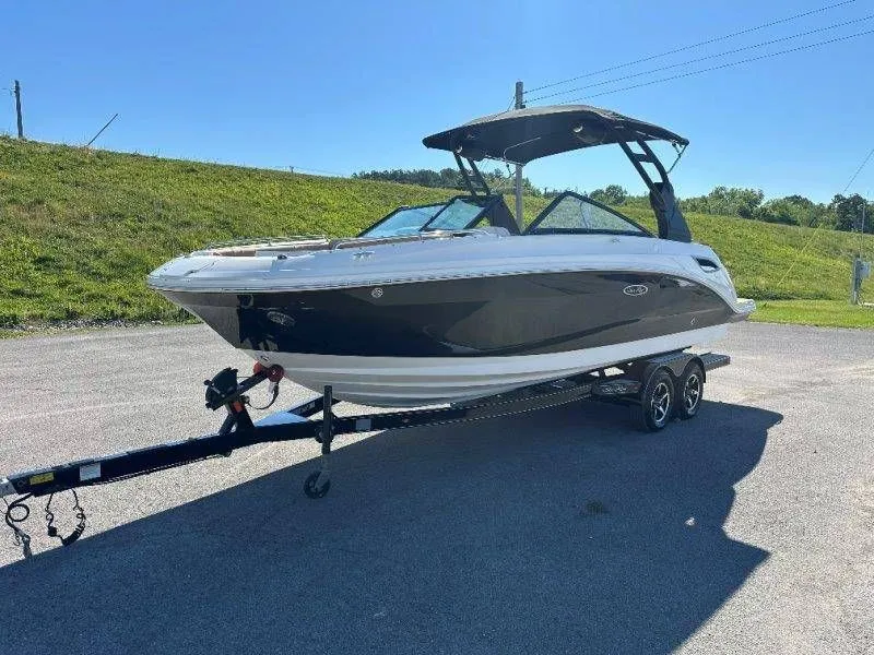 Slide: The Image of 2019 Sea Ray SDX 250 boat on trailer outdoors. - 7