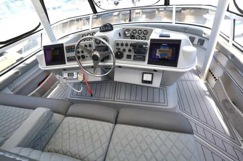 Slide: The Image of Cockpit of 2000 Carver 504 Cockpit Motor Yacht with modern navigation equipment. - 5
