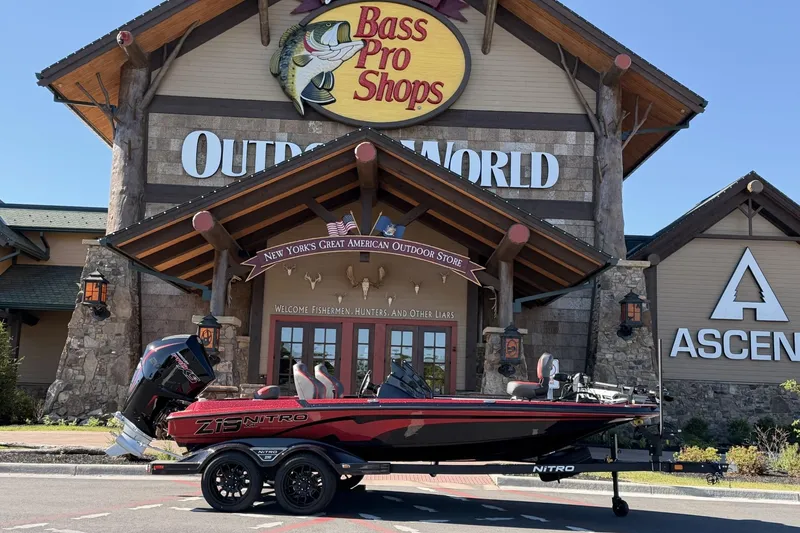 The Image of 2026 Nitro Z19 XL Pro boat displayed outside Bass Pro Shops Outdoor World. - 0