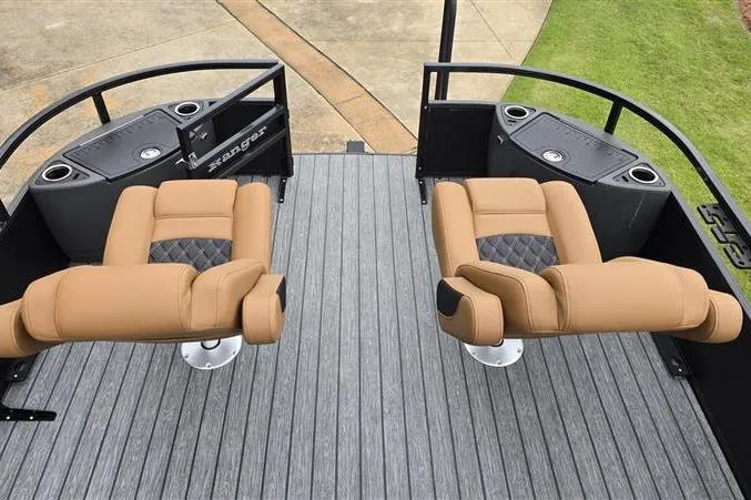 Slide: The Image of 2026 Ranger 223F boat interior with tan seats and sleek deck design. - 8