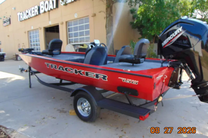 Slide: The Image of 2026 Tracker Pro Team 190 boat with Mercury engine at dealership. - 13