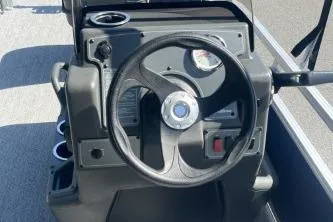 Slide: The Image of Steering console of 2026 Sun Tracker Bass Buggy 16 XL Select pontoon boat. - 6