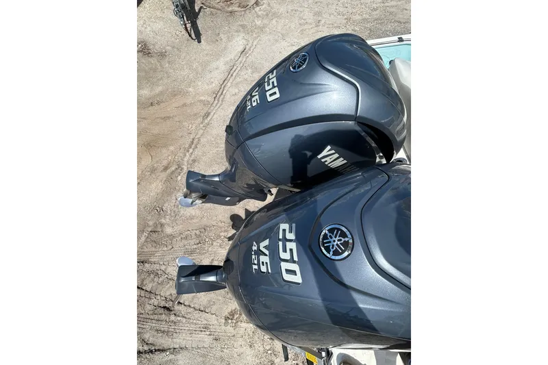 Slide: The Image of Twin Yamaha 250 V6 outboard engines on a 2024 Key West 263 FS boat. - 21