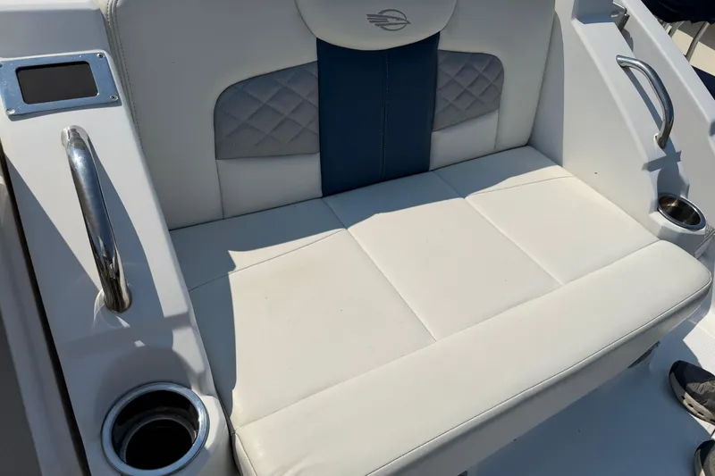 Slide: The Image of Chaparral 327 SSX 2012 boat seating with cup holders and stylish upholstery. - 10