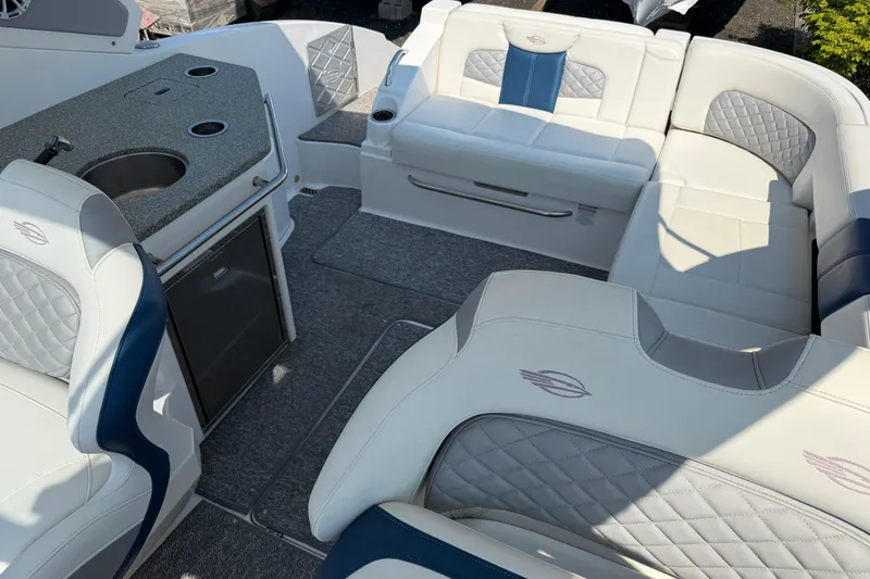 Slide: The Image of Interior of 2012 Chaparral 327 SSX boat with luxurious seating and kitchenette. - 19