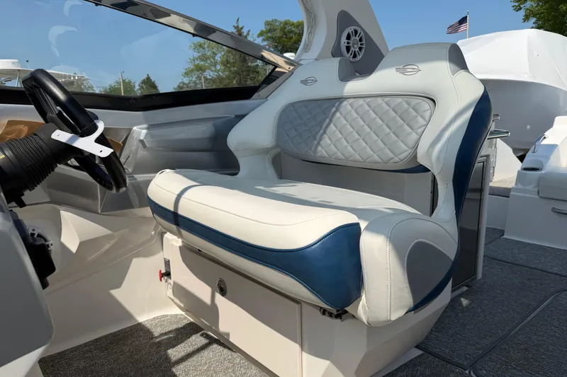 Slide: The Image of Luxury seating in 2012 Chaparral 327 SSX boat cockpit, featuring elegant design and premium materials. - 23