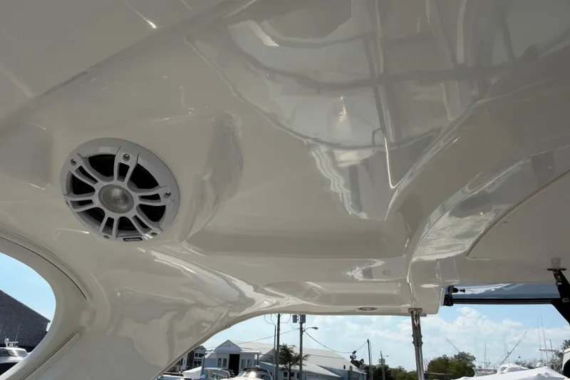Slide: The Image of 2012 Chaparral 327 SSX boat interior with speaker and glossy finish. - 33