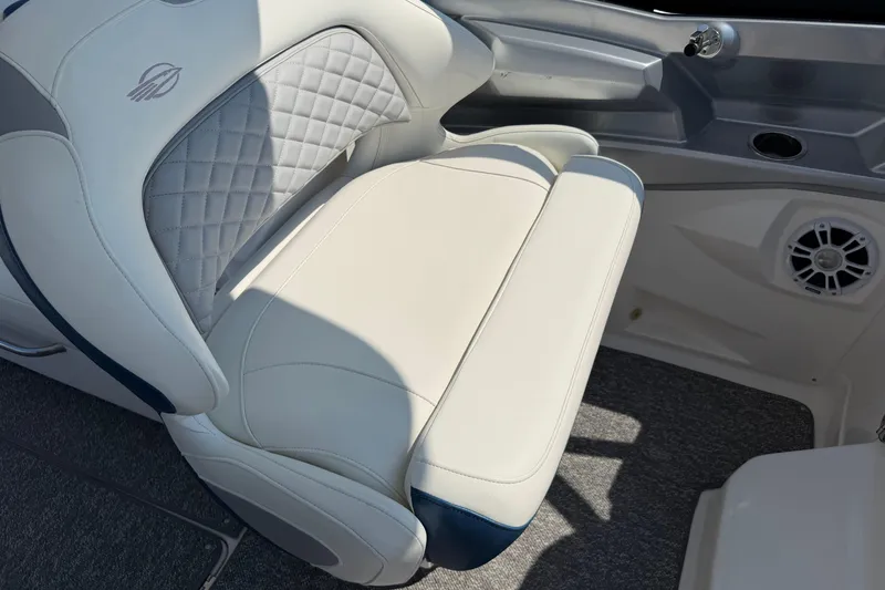 Slide: The Image of Luxurious seating on a 2012 Chaparral 327 SSX boat with quilted upholstery. - 34