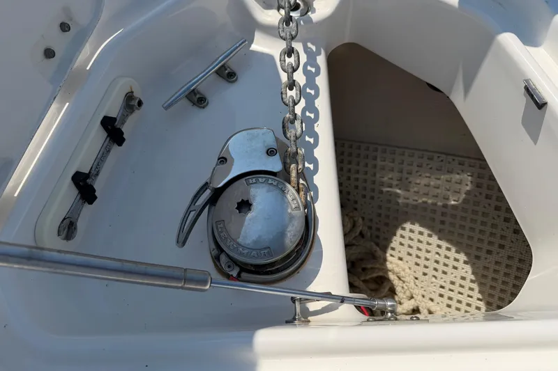Slide: The Image of Anchor winch system on a 2012 Chaparral 327 SSX boat deck. - 45