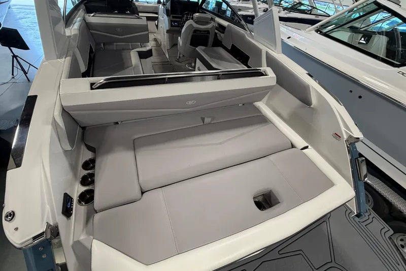 Slide: The Image of 2022 Cobalt R6 Surf boat interior with spacious seating and modern design. - 10