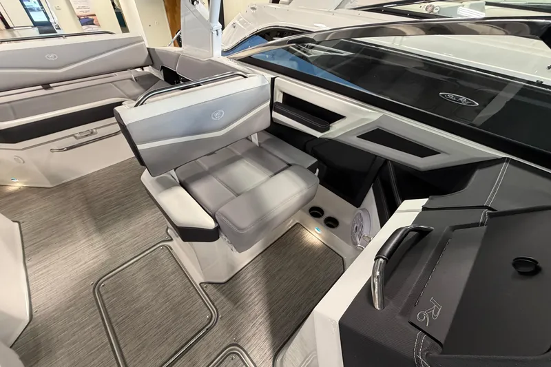 Slide: The Image of Interior of a 2022 Cobalt R6 Surf boat, featuring sleek seating and modern design. - 16