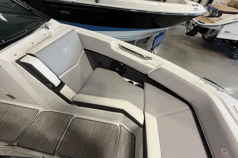 Slide: The Image of 2022 Cobalt R6 Surf boat interior with luxurious gray seating and modern design. - 23