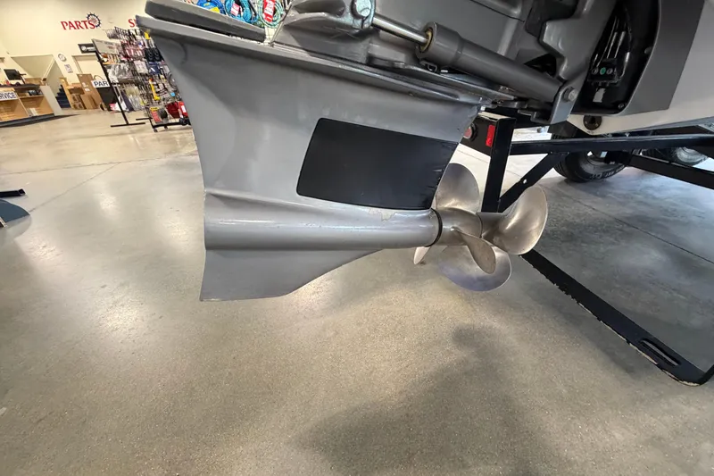 Slide: The Image of 2022 Cobalt R6 Surf boat propeller in showroom setting. - 27