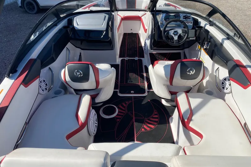 Slide: The Image of 2014 Scarab 195 H.O. Impulse boat interior with red and white seating and modern dashboard. - 5