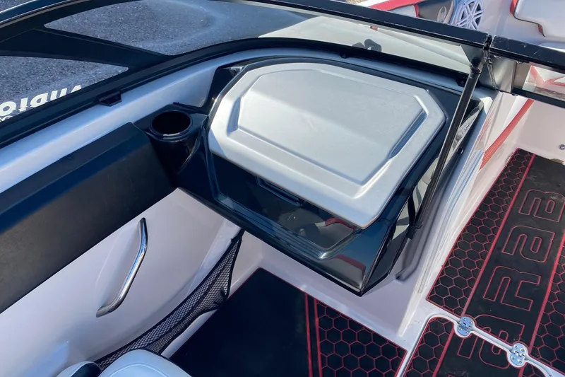 Slide: The Image of Interior view of a 2014 Scarab 195 H.O. Impulse boat, featuring sleek design elements. - 8