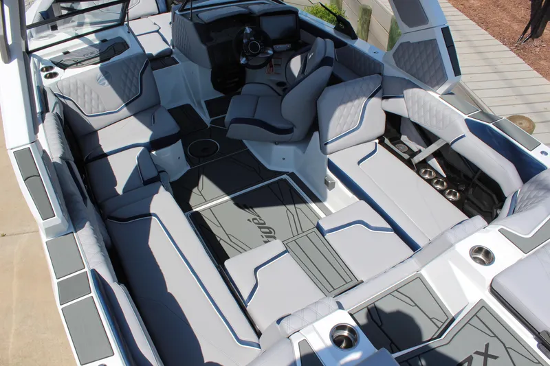 Slide: The Image of 2026 Tigé 22RZX boat interior with luxurious seating and modern design features. - 10