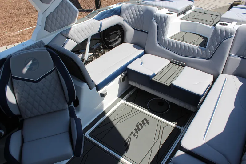Slide: The Image of Luxurious interior of 2026 Tigé 22RZX boat with plush seating and modern design. - 11