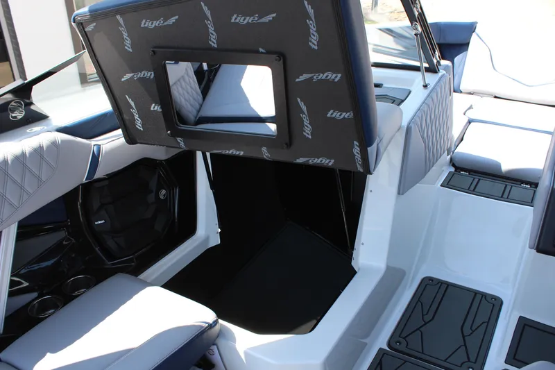 Slide: The Image of 2026 Tigé 22RZX boat interior with modern seating and sleek design. - 13