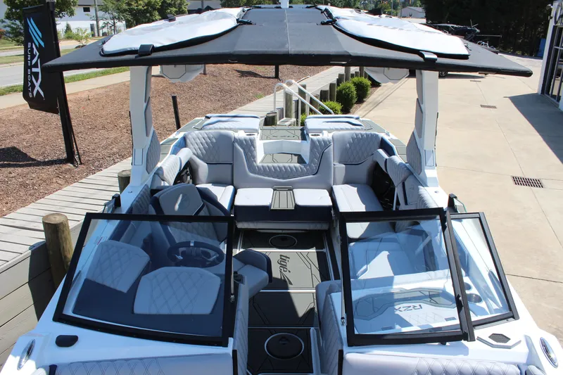 Slide: The Image of 2026 Tigé 22RZX boat interior with luxurious seating and sleek design. - 15