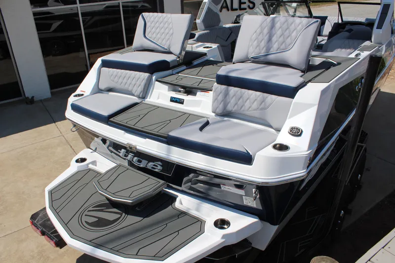 Slide: The Image of 2026 Tigé 22RZX boat with sleek seating and modern design features. - 8