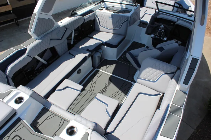 Slide: The Image of 2026 Tigé 22RZX boat interior with luxurious seating and modern design. - 9