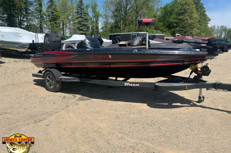 The Image of 2022 Triton 18 TrX boat on trailer, parked outdoors at D&R Sports Center. - 0
