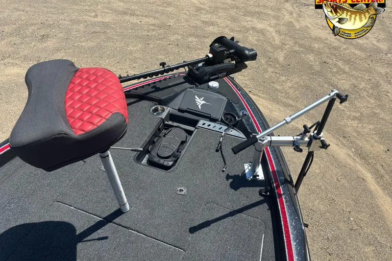 Slide: The Image of 2022 Triton 18 TrX boat deck with red seat and fishing equipment. - 6