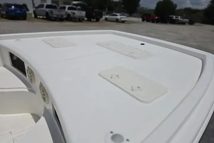 Slide: The Image of 2017 Mako Pro Skiff 21 CC boat deck with storage compartments. - 9