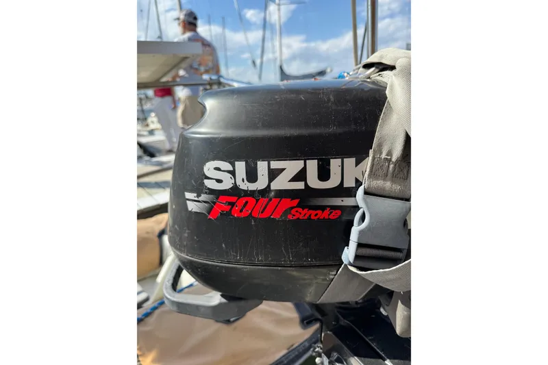 Slide: The Image of ```json { "alt_text": "Suzuki four-stroke engine on a 1981 S2 36 sailboat." } ``` - 18