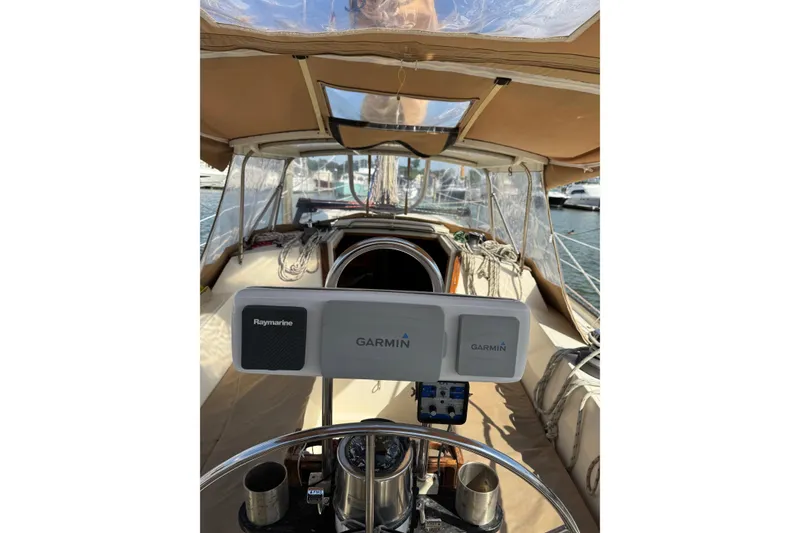 Slide: The Image of Cockpit of 1981 S2 36 sailboat with Garmin and Raymarine navigation equipment. - 4