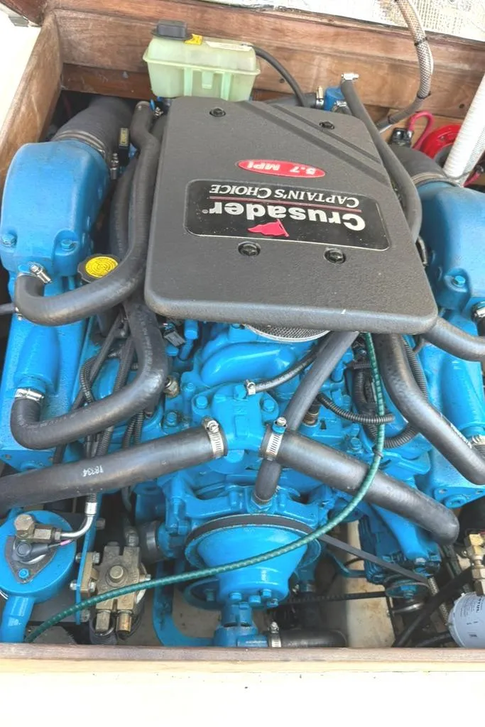 Slide: The Image of Engine of 1986 Dusky 26 Custom boat, featuring Crusader Captain's Choice components. - 25