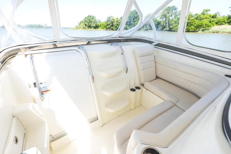 Slide: The Image of Luxurious interior of 2008 Hydrosport 3500 VX boat with plush seating and scenic water view. - 16