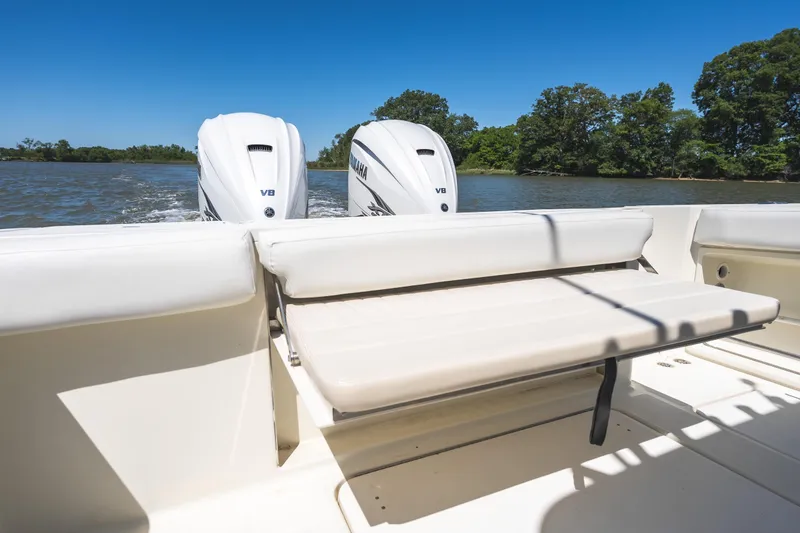 Slide: The Image of 2008 Hydrosport 3500 VX boat with Yamaha V8 engines on a sunny day. - 21