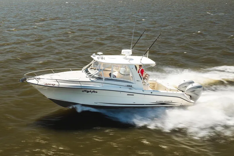 Slide: The Image of 2008 Hydrosport 3500 vx boat cruising on water. - 7