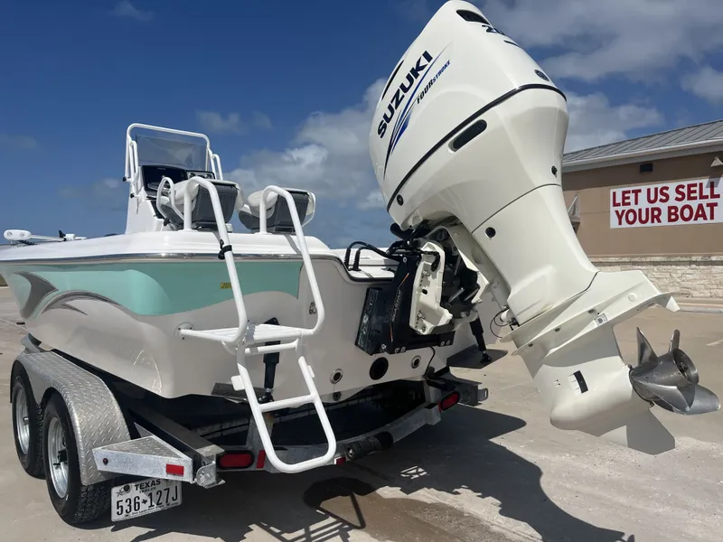 Slide: The Image of 2017 Blue Wave 2300 boat with Suzuki outboard motor. - 10