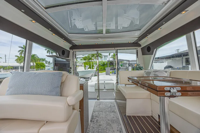 Slide: The Image of Luxurious interior of 2012 Cruisers Yachts 48 Cantius with elegant seating and glass roof. - 22