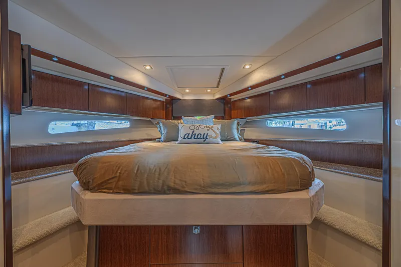 Slide: The Image of Luxurious bedroom interior of 2012 Cruisers Yachts 48 Cantius with elegant wood finishes. - 40