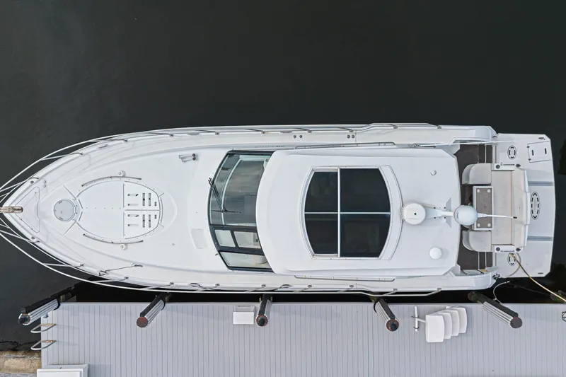 Slide: The Image of Overhead view of 2012 Cruisers Yachts 48 Cantius docked at marina. - 6