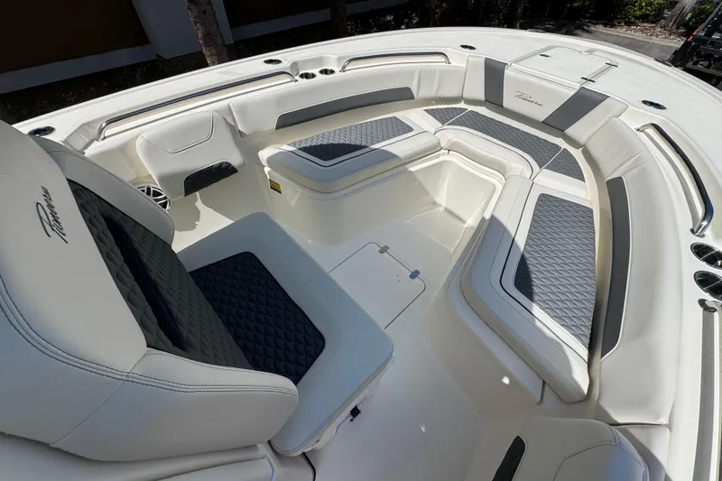 Slide: The Image of Luxurious seating area on a 2026 Pioneer 250 Pelagic boat, featuring elegant upholstery. - 8