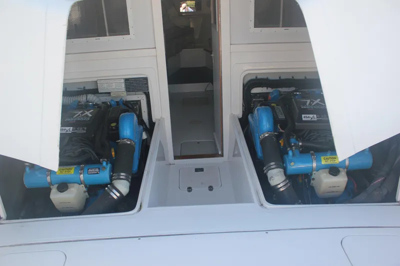 Slide: The Image of Engine compartment of a 1995 Blackfin 29 Flybridge boat with twin engines. - 5