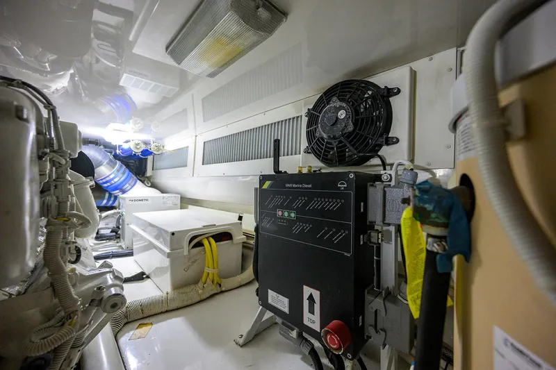 Slide: The Image of Engine room of 2004 Viking 48 Convertible yacht with marine diesel components. - 18