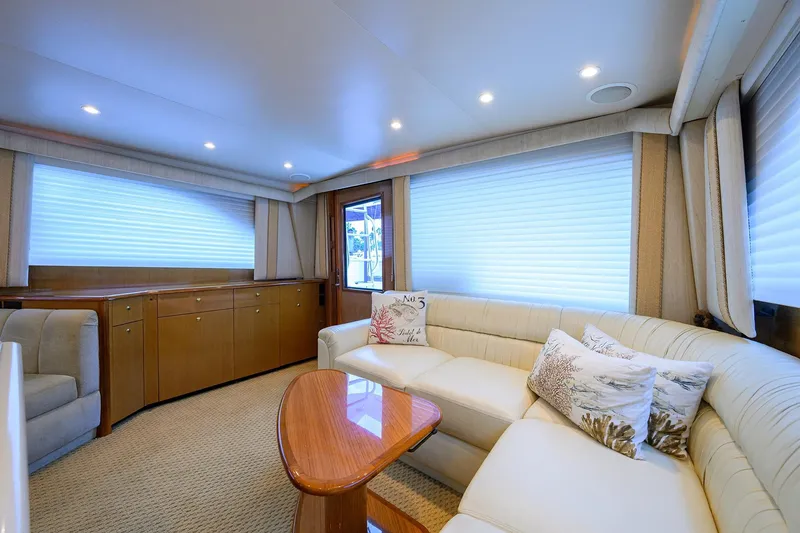 Slide: The Image of Luxurious interior of 2004 Viking 48 Convertible yacht with elegant seating and decor. - 31