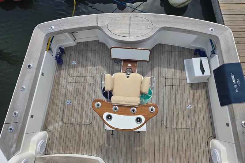 Slide: The Image of 2004 Ocean Yachts 50 Super Sport fishing deck with chair and rod holders. - 45
