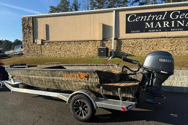 Slide: The Image of 2026 Excel 1751 Shallow Water F4 boat with Yamaha motor at Central Georgia Marina. - 2