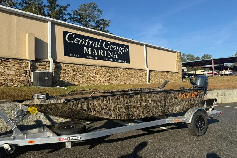 Slide: The Image of 2026 Excel 1751 Shallow Water F4 boat on trailer at Central Georgia Marina. - 5