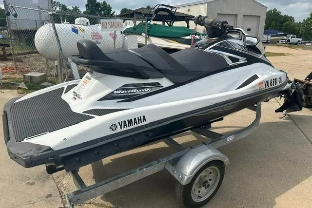 Slide: The Image of 2016 Yamaha WaveRunner VX Cruiser on trailer, parked outdoors. - 8
