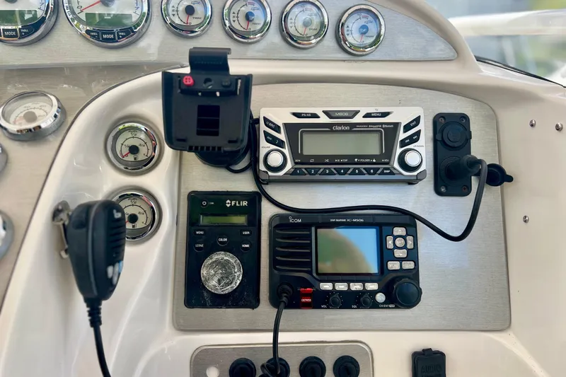 Slide: The Image of Control panel of a 2011 Deep Impact 36 Open boat with gauges and electronics. - 45