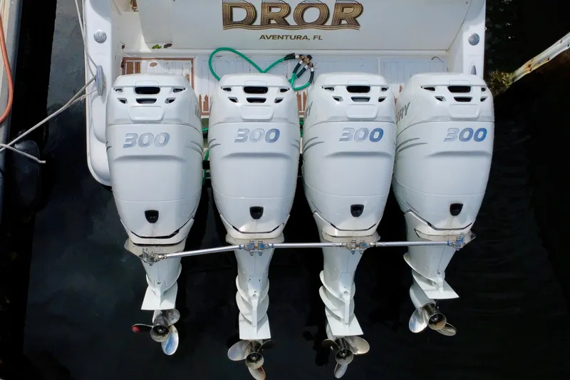 Slide: The Image of Four Mercury 300 outboard engines on a 2011 Deep Impact 36 Open boat in Aventura, FL. - 5