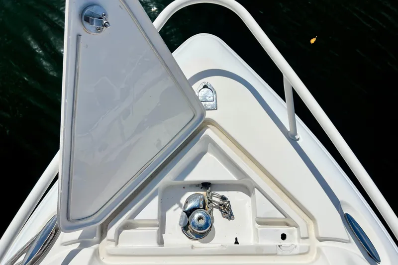Slide: The Image of Bow of 2011 Deep Impact 36 Open boat with anchor storage and railing. - 8