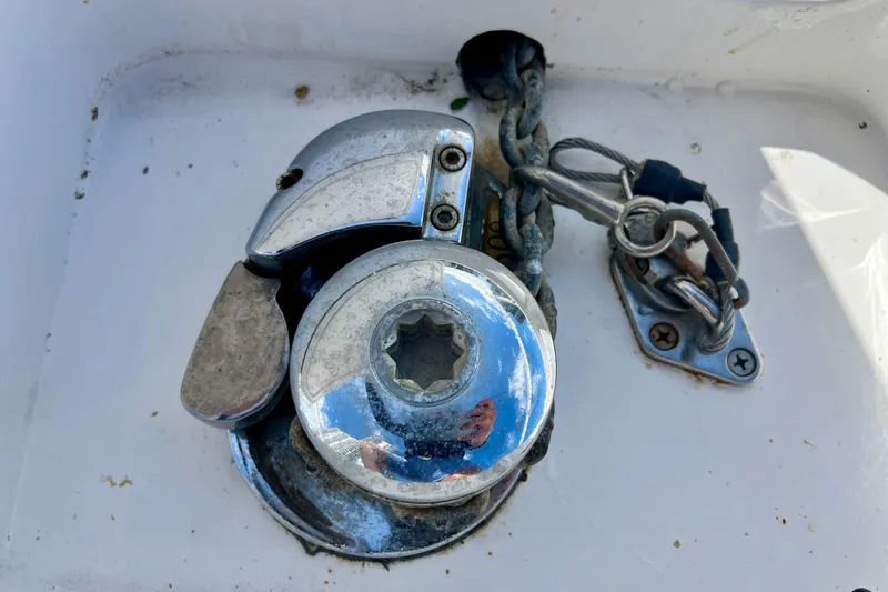Slide: The Image of Chrome boat winch and chain on 2011 Deep Impact 36 Open. - 9